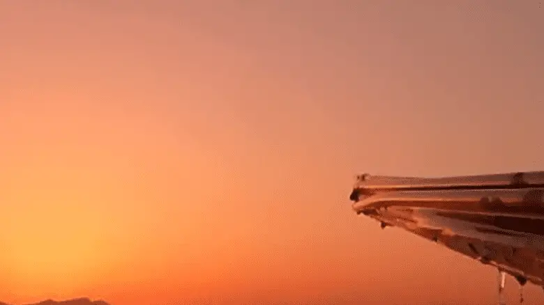 silhouette of boat and water