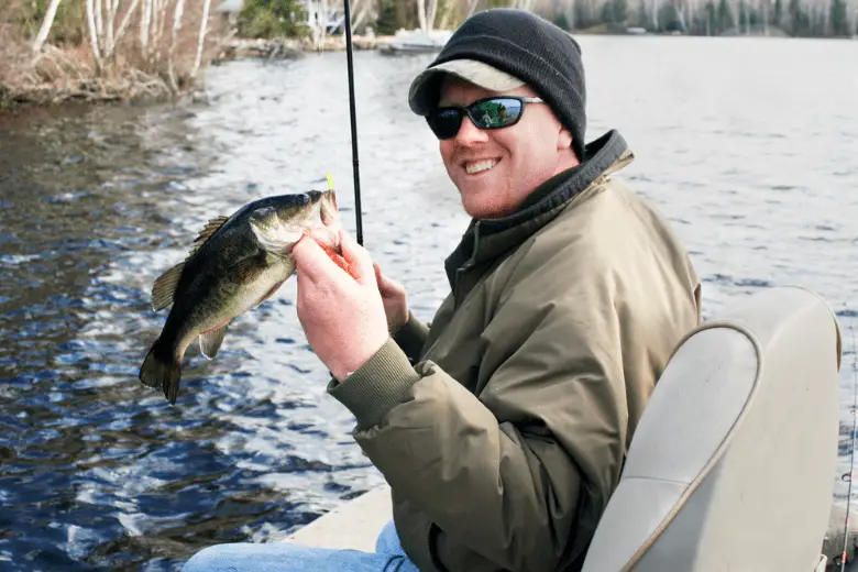 Picture of large mouth bass caught in a boat