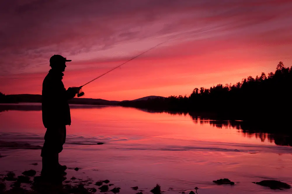 Man fishing at night