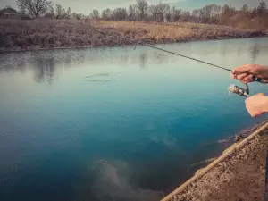 Picture of a man fishing on the lake