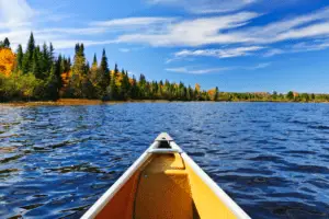 Picture of the front of a canoe on a lake