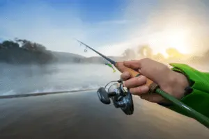 Close up of fisherman holding fishing rod
