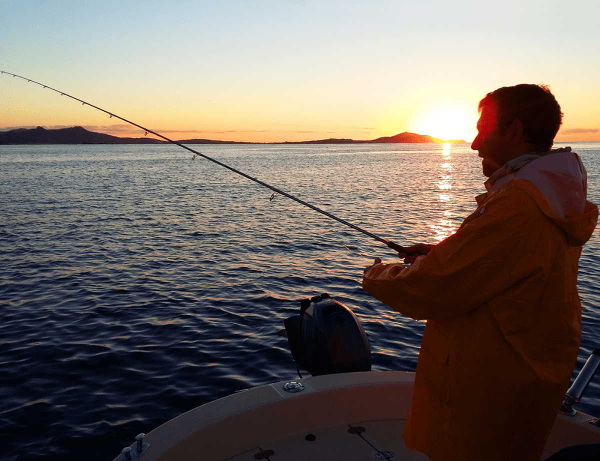 Man fishing on a boat