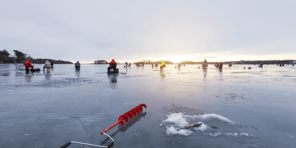 A scene of a group of people ice fishing