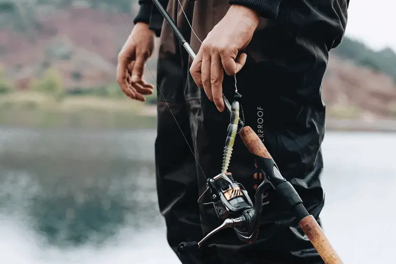 angler holding a fishing rod