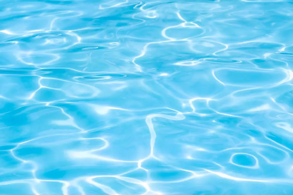 A close up image of a blue swimming pool.